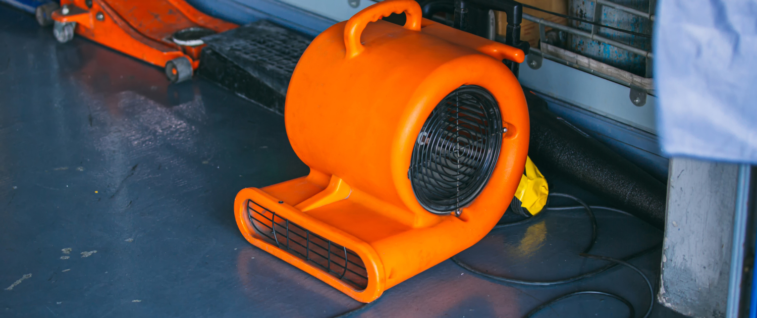 Air mover. Centrifugal fan drying water damage. Residential water damage clean up and mitigation. American Restoration is here to help in an emergency if you're home or commercial building has water damage, flooding, sewage damage in Colorado